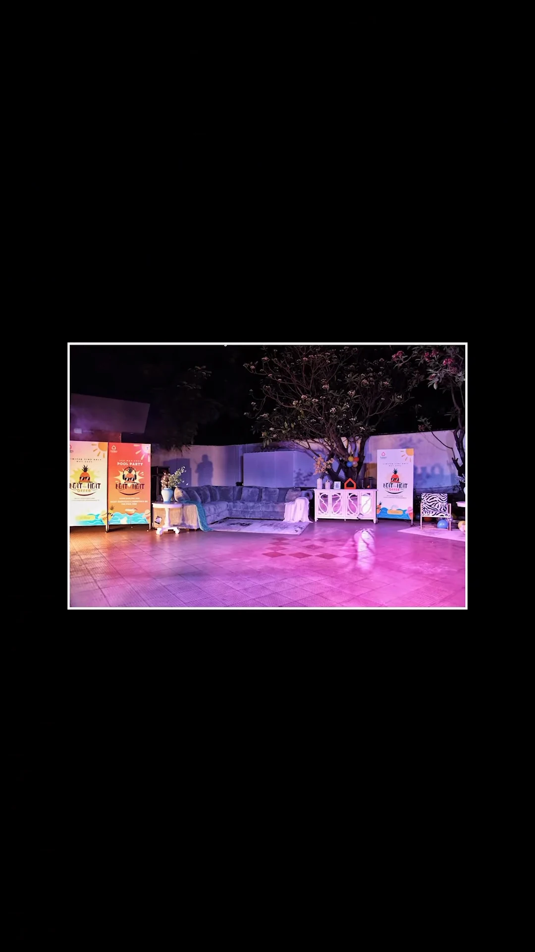 The pool-party furniture setting with its original Beat the Heat standees